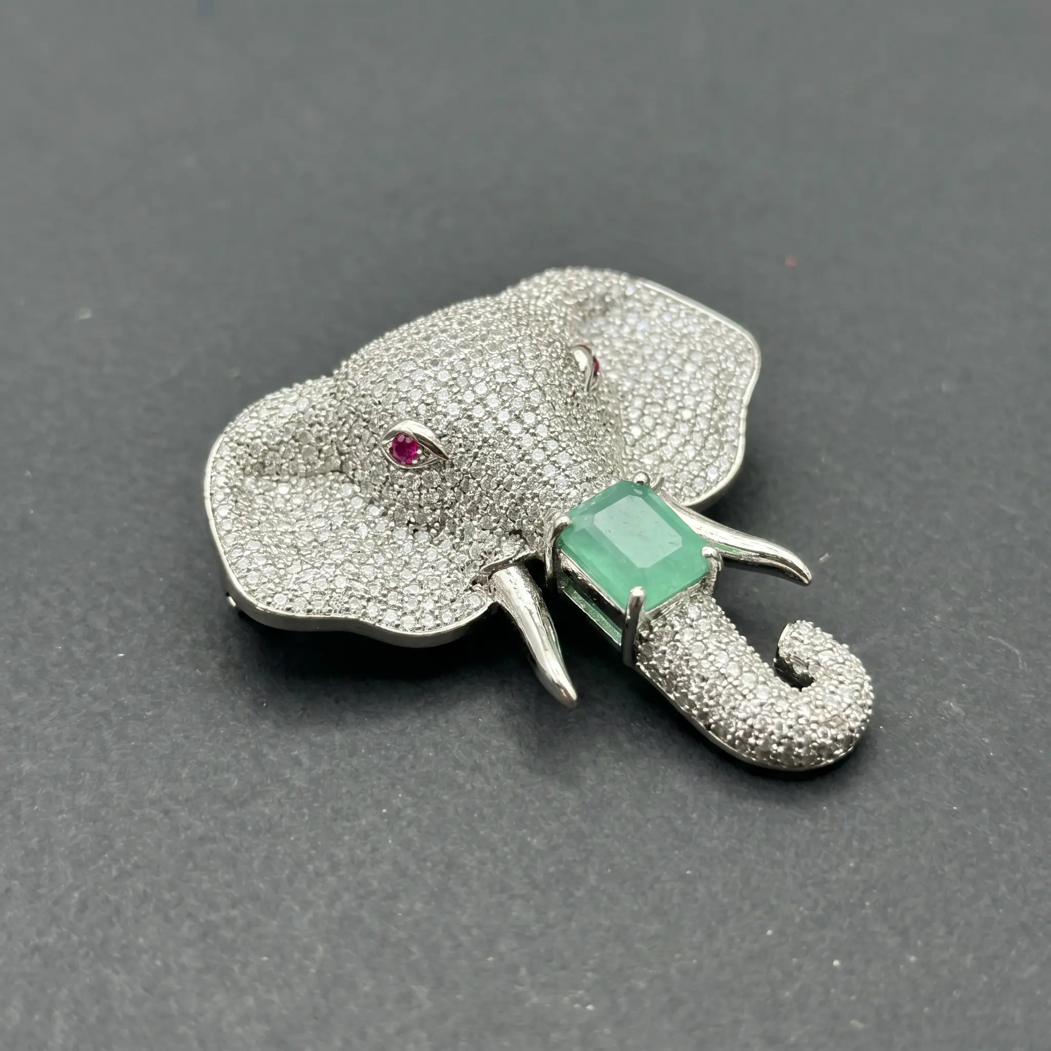 Salitaire Shimmering Elephant Head Brooch Pin