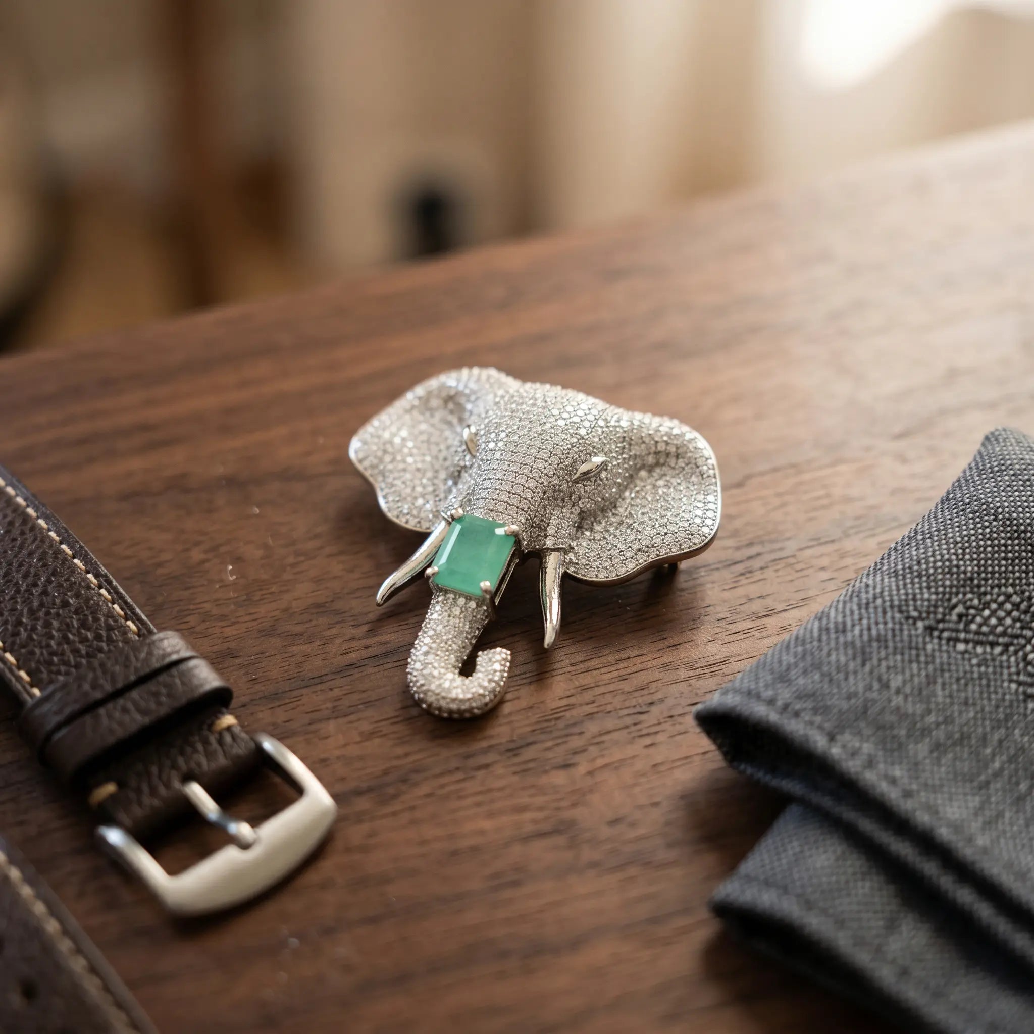 Salitaire Shimmering Elephant Head Brooch Pin
