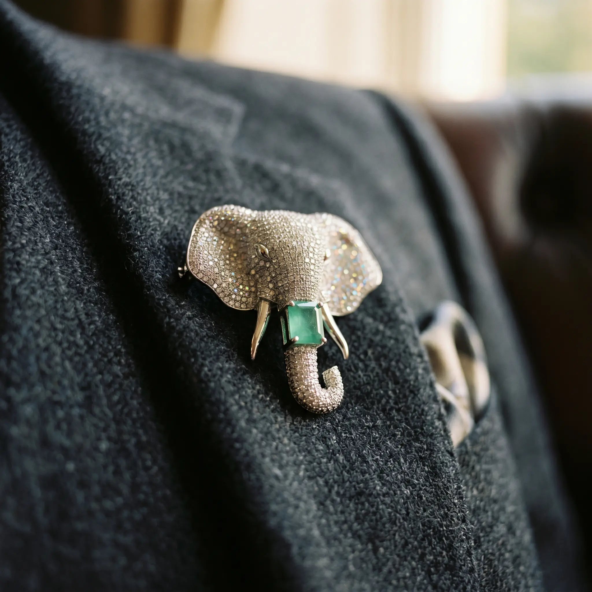 Salitaire Shimmering Elephant Head Brooch Pin