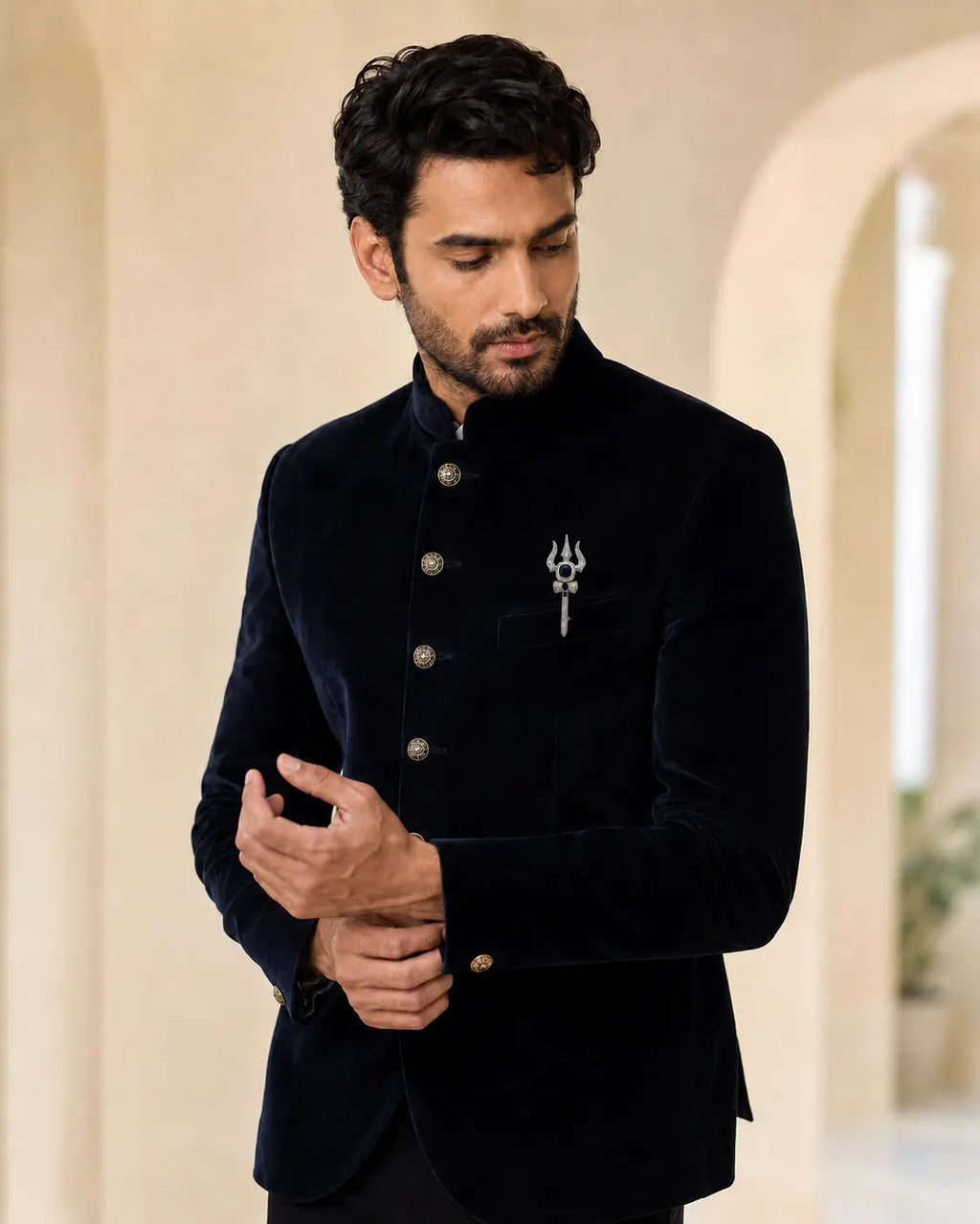Neelkanth Trishul brooch styled on a midnight blue bandhgala