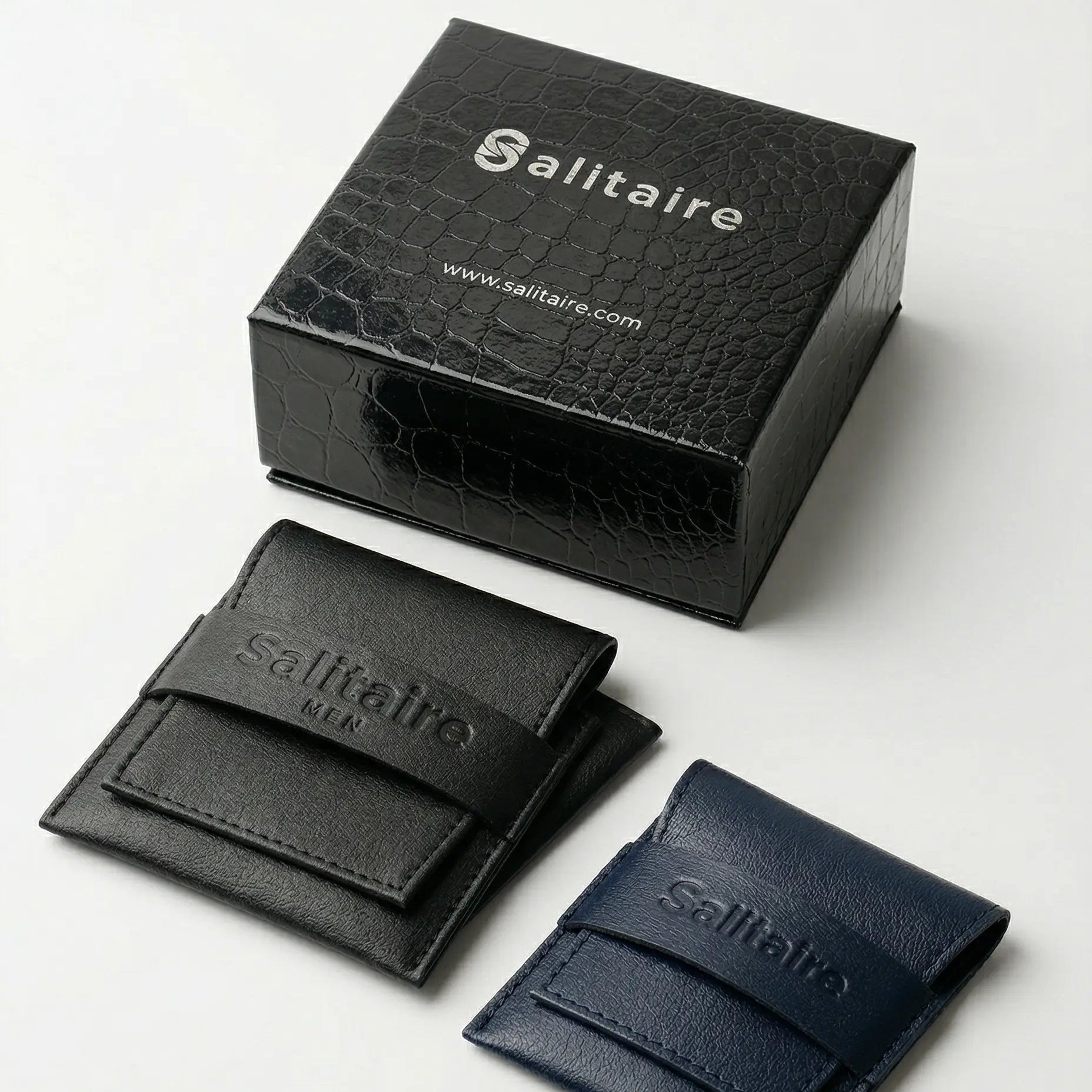 Black and navy leather wallets with 'Salitaire' branding on a white background