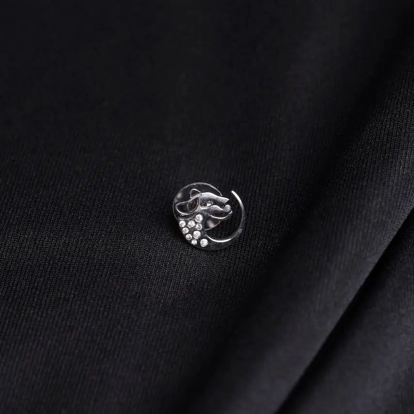 Salitaire Panther Stud Earring in antique silver with sculpted panther design and AAA+ white cubic zirconia stones on black fabric