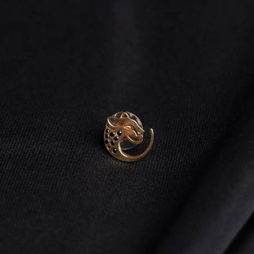 Salitaire Panther Stud Earring in antique silver with sculpted panther design and AAA+ white cubic zirconia stones on black fabric